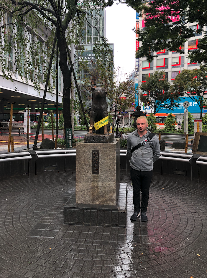 me standing in front of a statue of a dog in Shibuya, Tokyo